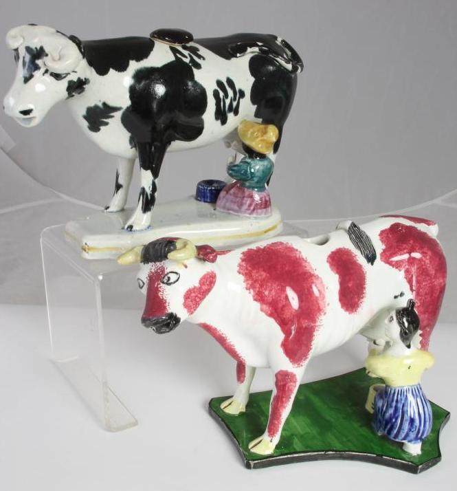 TWO POTTERY COW CREAMERS Image