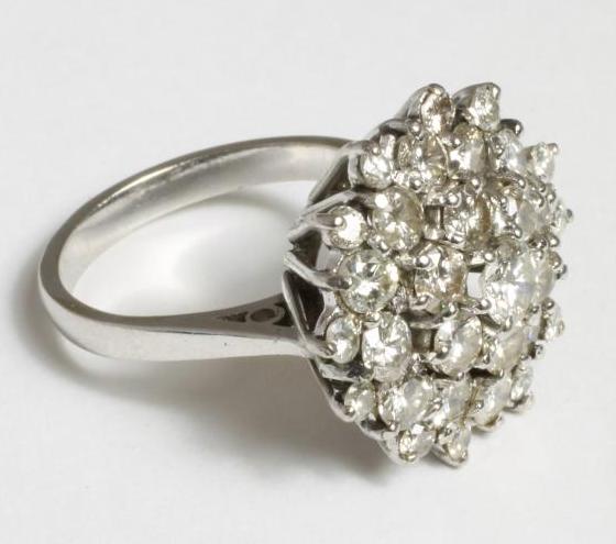 A DIAMOND CLUSTER RING Image