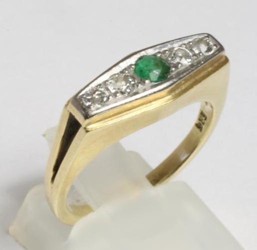 A FIVE STONE EMERALD AND DIAMOND RING Image