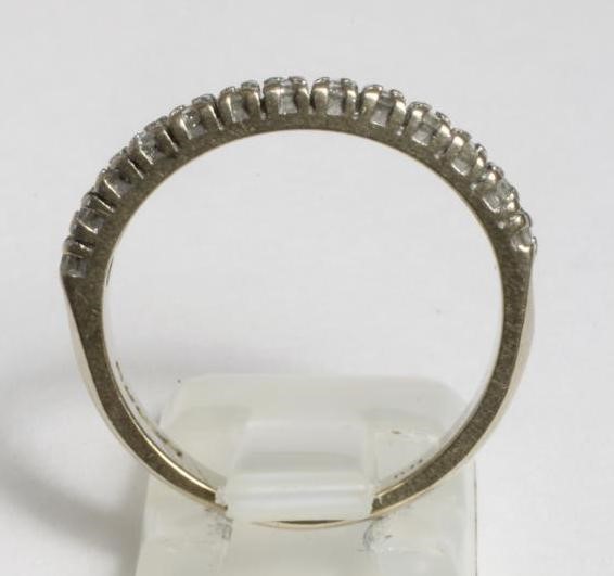 A DIAMOND HALF HOOP ETERNITY RING Image