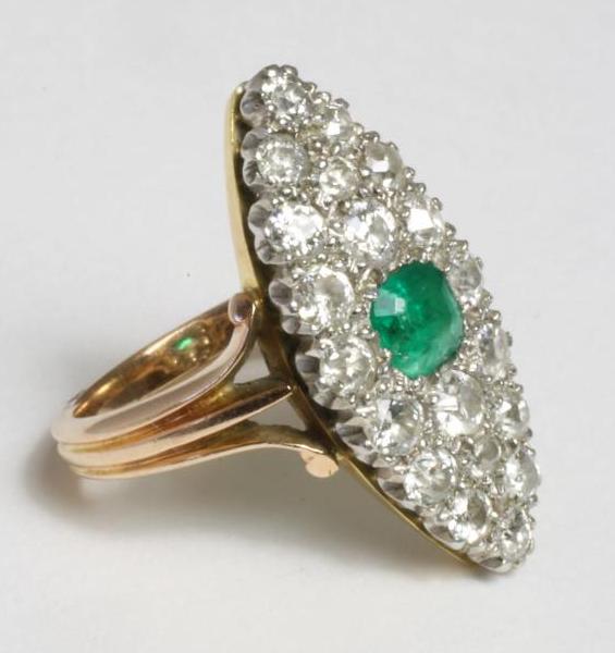 A VICTORIAN EMERALD AND DIAMOND MARQUISE PLAQUE RING Image