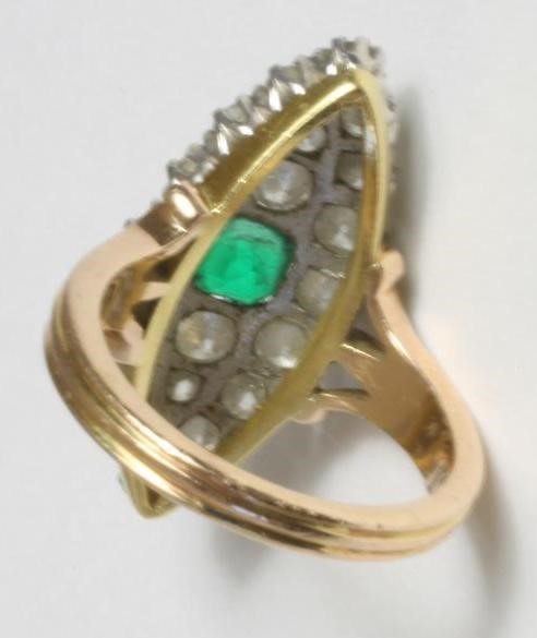 A VICTORIAN EMERALD AND DIAMOND MARQUISE PLAQUE RING Image