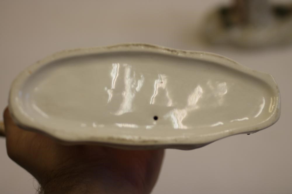 A PAIR OF VICTORIAN STAFFORDSHIRE POTTERY GREYHOUNDS Image