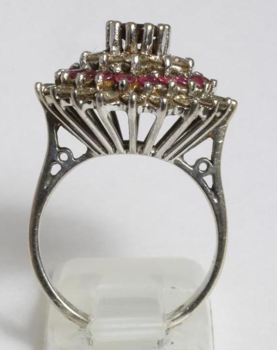 A RUBY AND DIAMOND CLUSTER COCKTAIL RING Image