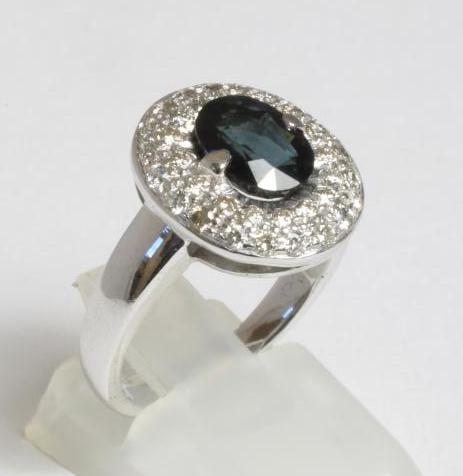 A SAPPHIRE AND DIAMOND DRESS RING Image