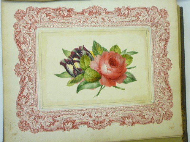 A VICTORIAN LEATHER BOUND ALBUM belonging to Mrs R W Buttemer Image