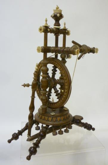 A MINIATURE SOFTWOOD SPINNING WHEEL Image
