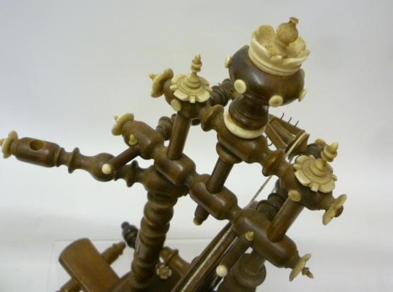 A MINIATURE SOFTWOOD SPINNING WHEEL Image