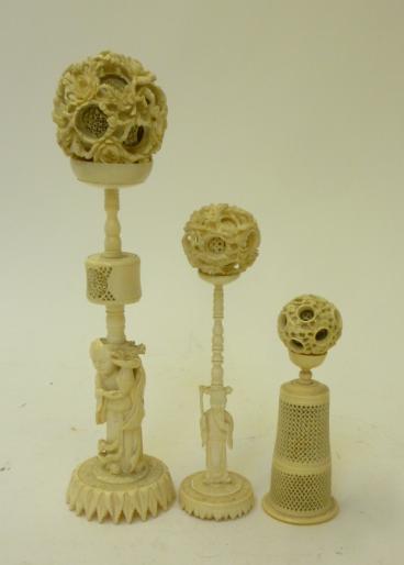 THREE CHINESE IVORY PUZZLE BALLS AND STANDS Image