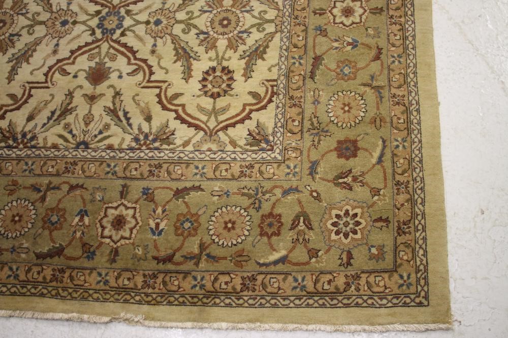 A CHINESE WASHED AND FRINGED CARPET Image