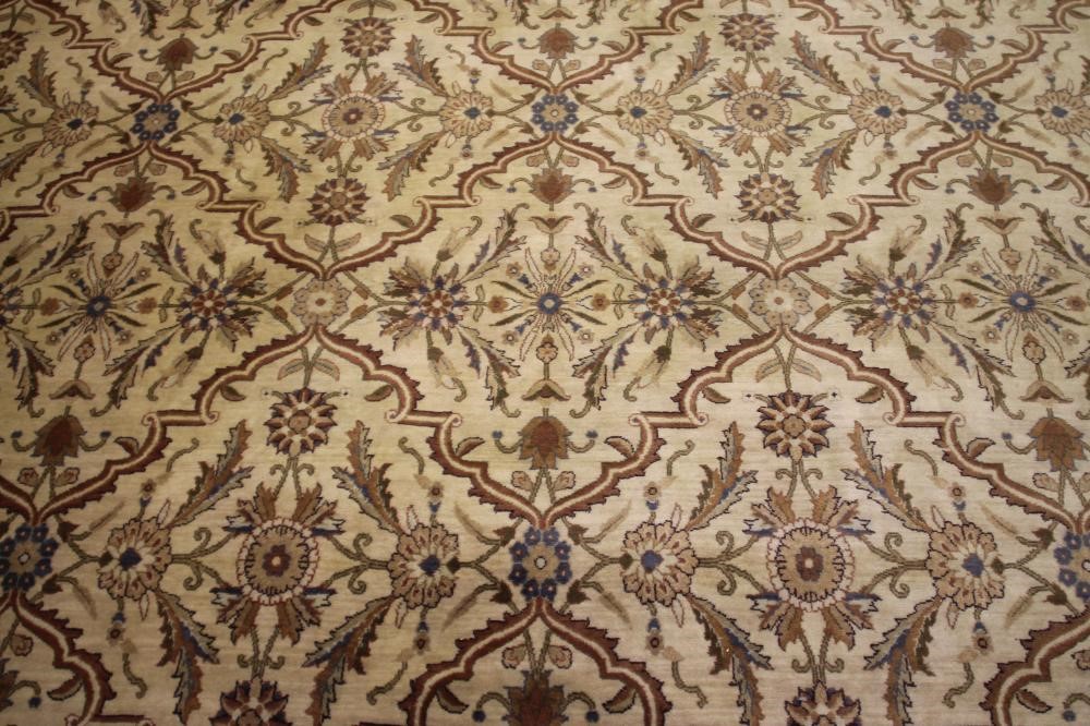 A CHINESE WASHED AND FRINGED CARPET Image