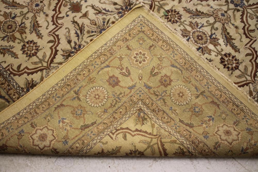 A CHINESE WASHED AND FRINGED CARPET Image