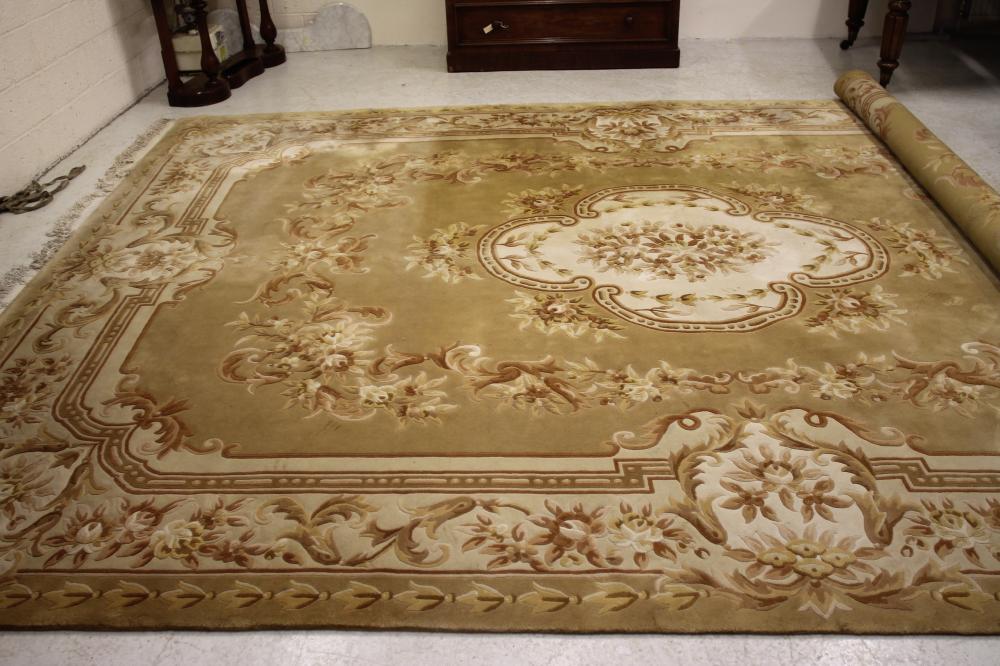 A CHINESE WASHED AND FRINGED CARPET Image