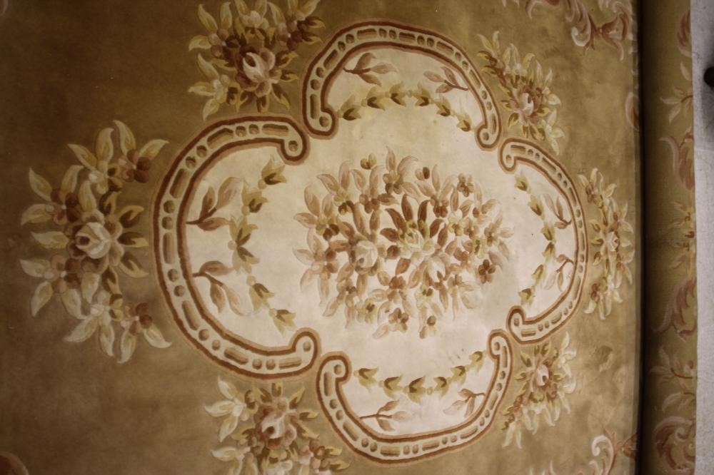 A CHINESE WASHED AND FRINGED CARPET Image