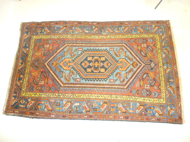 A PERSIAN RUG Image