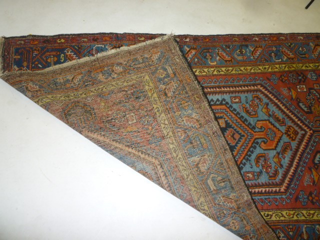 A PERSIAN RUG Image