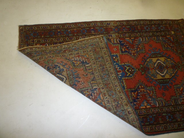 A PERSIAN RUG Image