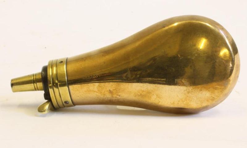 A BRASS PISTOL POWDER FLASK BY SYKES Image