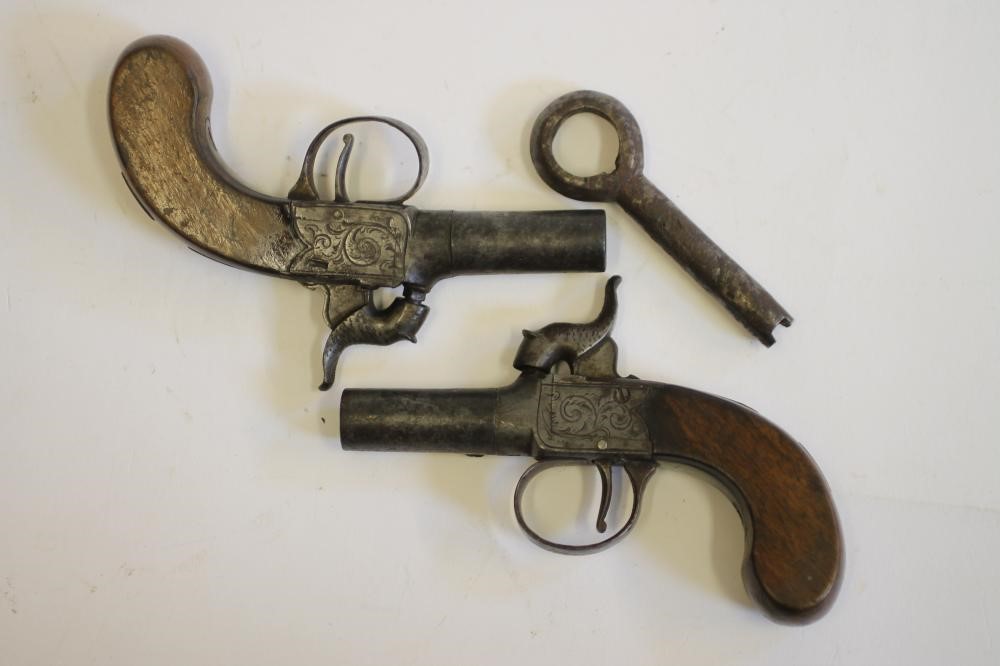 A PAIR OF PERCUSSION MUFF PISTOLS Image