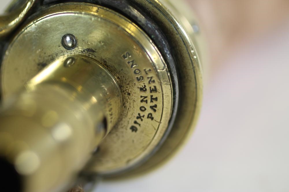 TWO BRASS POWDER FLASKS BY DIXON & SONS Image