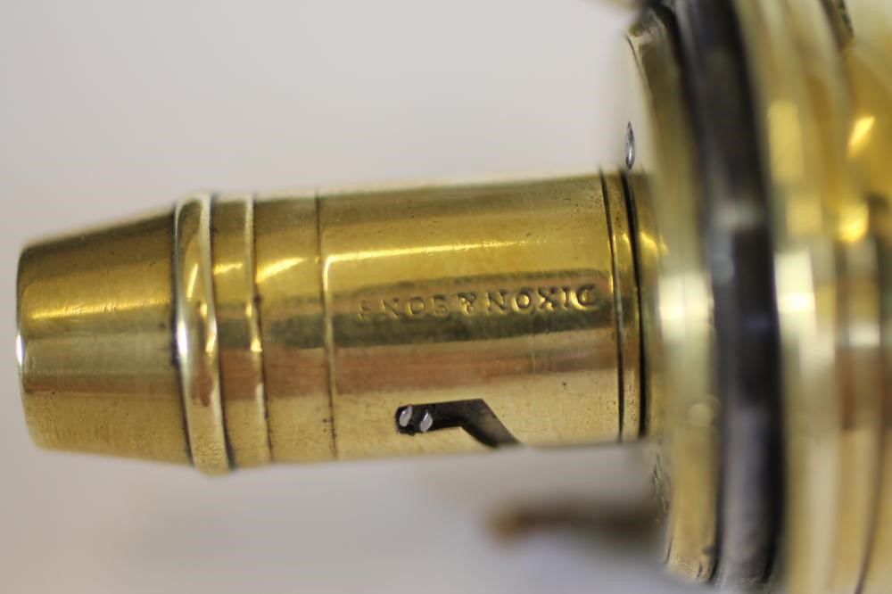 TWO BRASS POWDER FLASKS BY DIXON & SONS Image