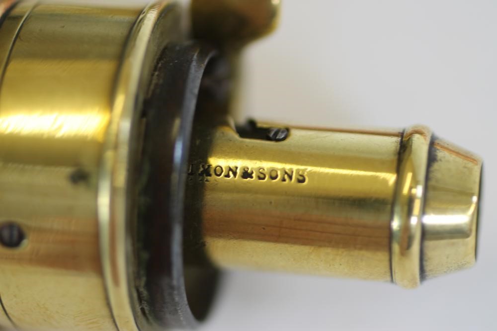 TWO BRASS POWDER FLASKS BY DIXON & SONS Image