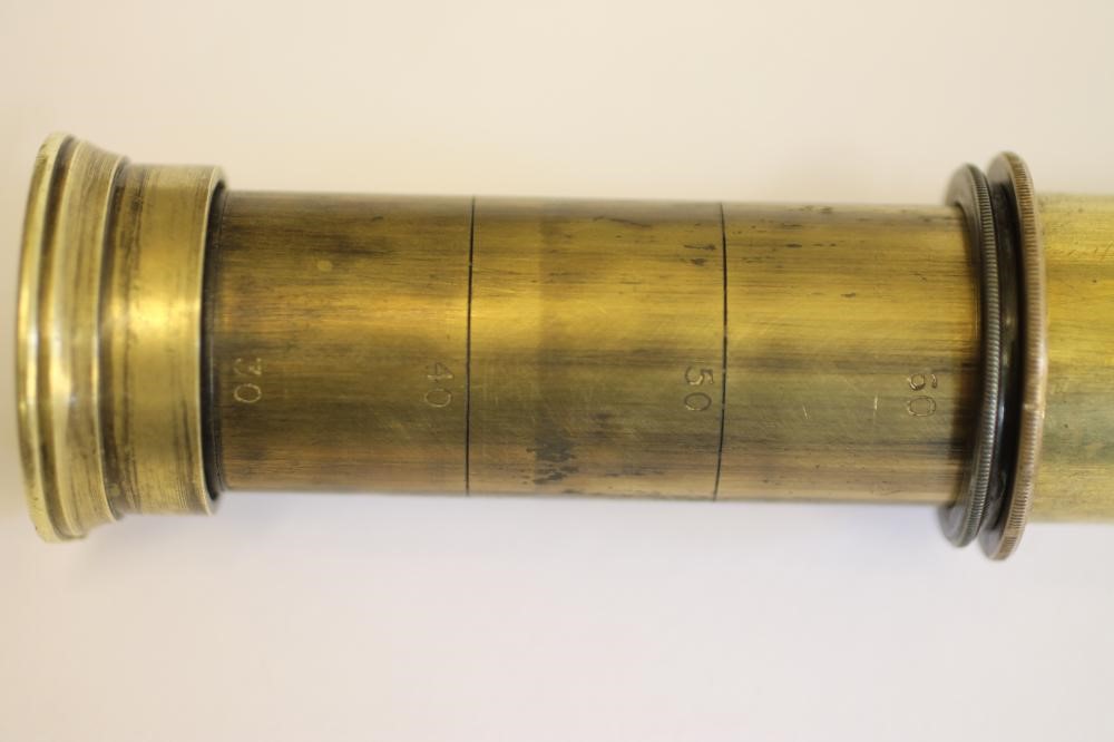 A FIVE DRAWER BRASS TELESCOPE by Dollond Image