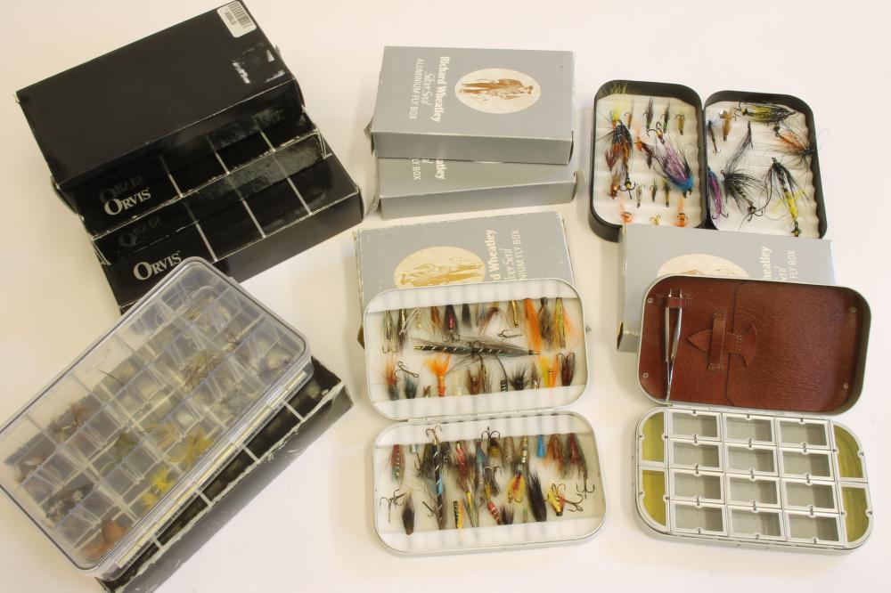 A COLLECTION OF FLY BOXES AND FLIES Image