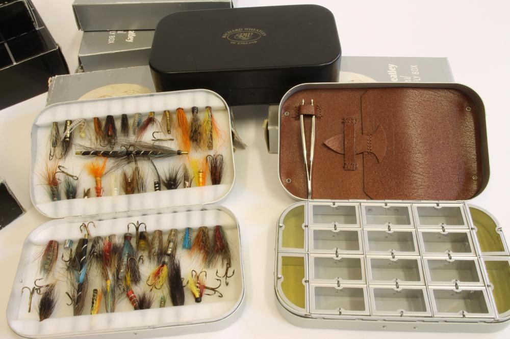 A COLLECTION OF FLY BOXES AND FLIES Image