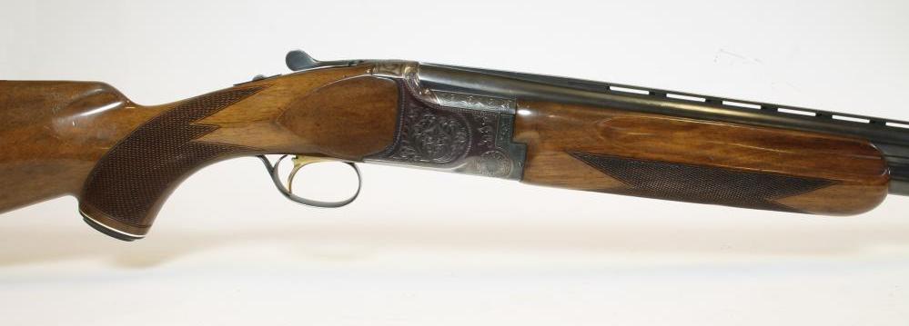 A B. C. MIROKU OVER AND UNDER 12 BORE SHOTGUN Image
