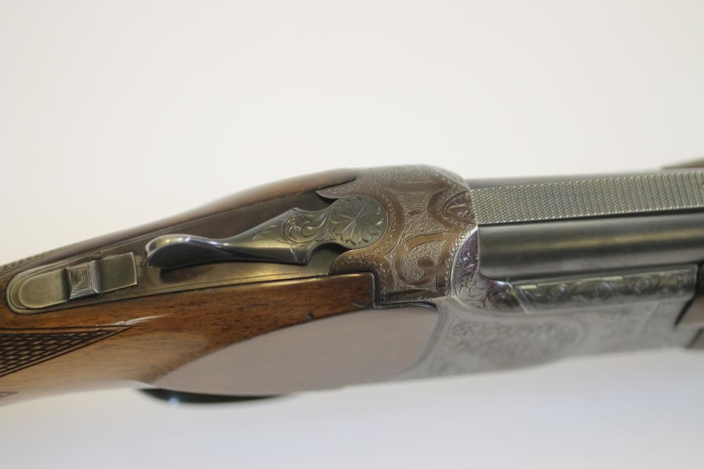 A B. C. MIROKU OVER AND UNDER 12 BORE SHOTGUN Image