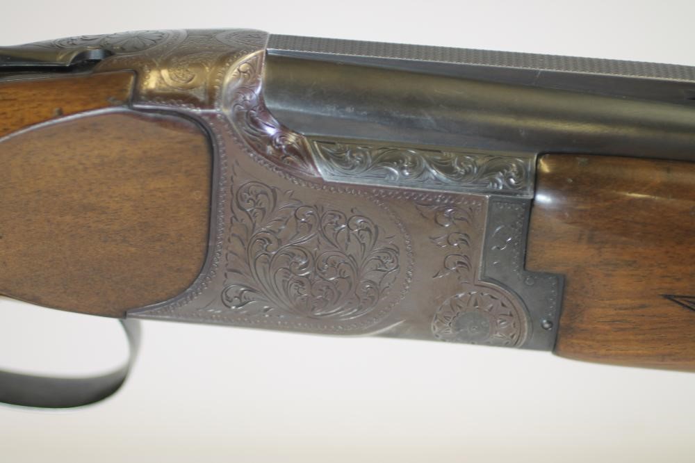 A B. C. MIROKU OVER AND UNDER 12 BORE SHOTGUN Image