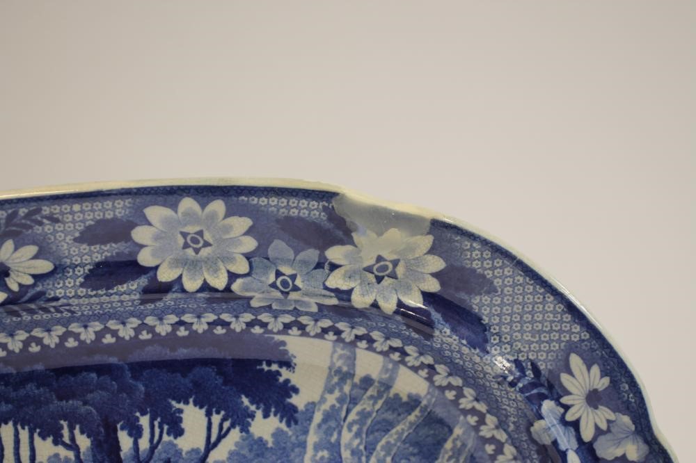 WILLIAM ADAMS "LIONS" BLUE AND WHITE PRINTED EARTHENWARE - A meat plate of rounded oblong form Image