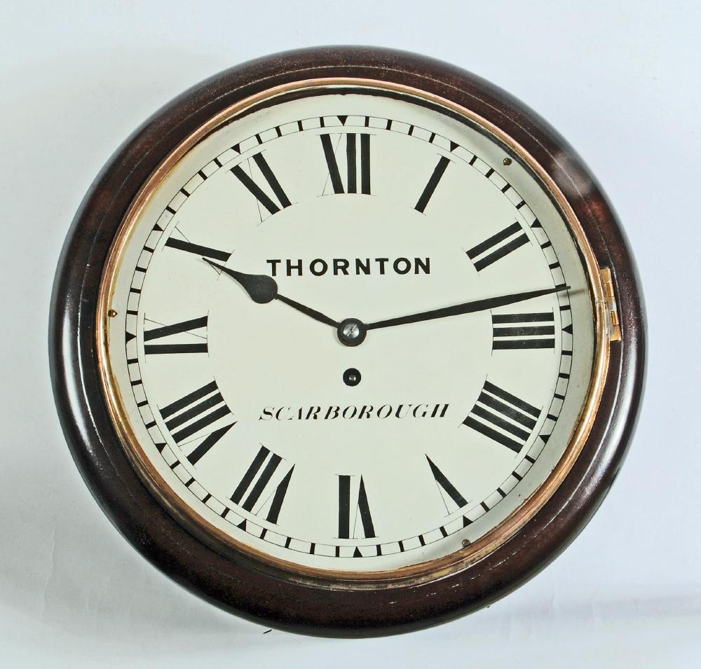 A MAHOGANY WALL CLOCK signed Thornton Image