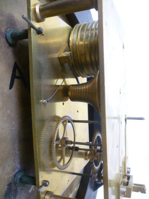 A MAHOGANY WALL CLOCK signed Thornton Image