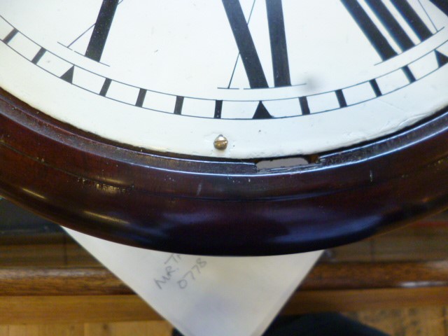 A MAHOGANY WALL CLOCK signed Thornton Image