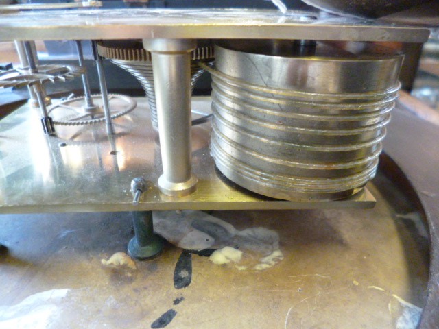 A MAHOGANY WALL CLOCK signed Thornton Image