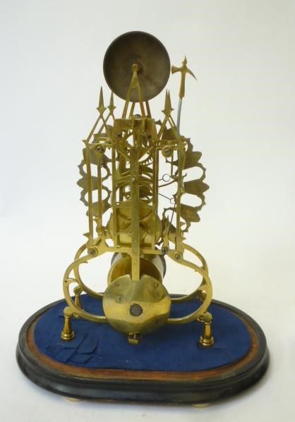 A BRASS SKELETON CLOCK Image
