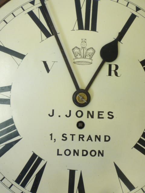 A MAHOGANY WALL CLOCK signed J. Jones Image