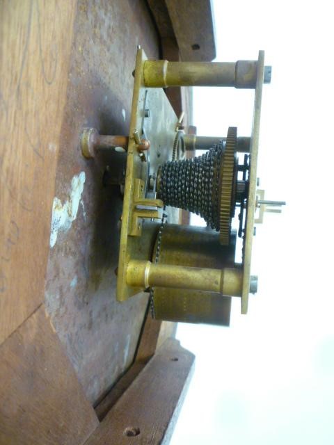 A MAHOGANY WALL CLOCK signed J. Jones Image