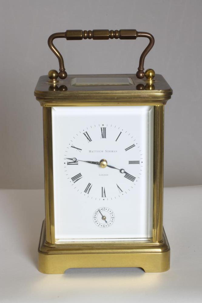 A SWISS BRASS CASED CARRIAGE CLOCK Image