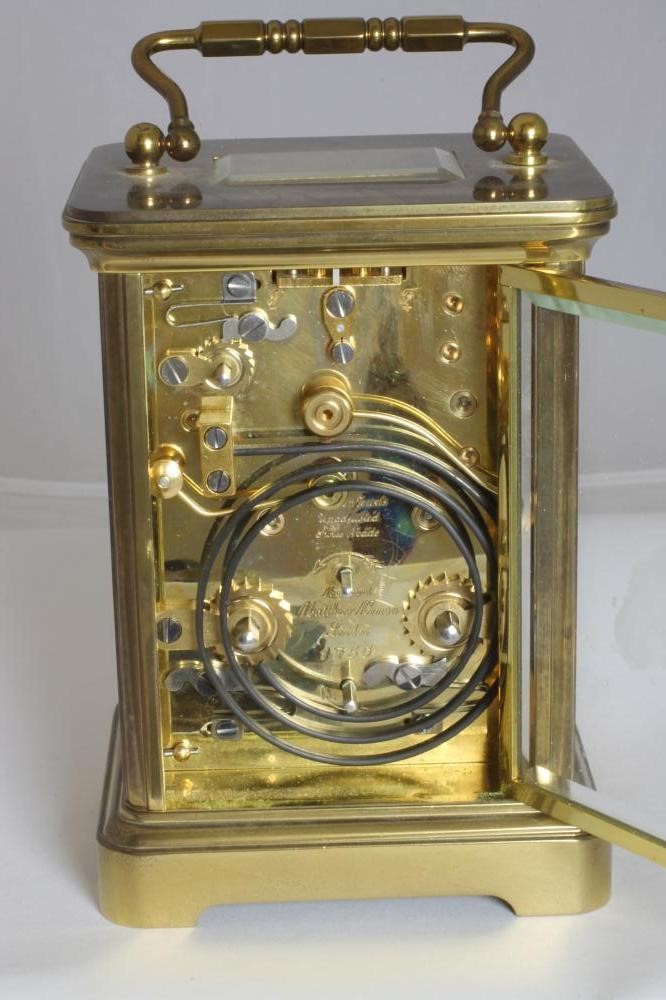 A SWISS BRASS CASED CARRIAGE CLOCK Image