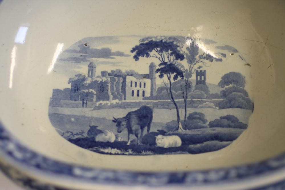YORKSHIRE INTEREST BLUE AND WHITE PRINTED EARTHENWARE- A "Slingsby Castle" soup tureen and cover of Image