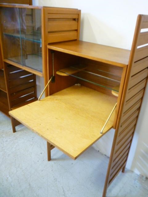 A STAPLES LADDERAX TEAK LIVING ROOM UNIT incorporating shelving Image
