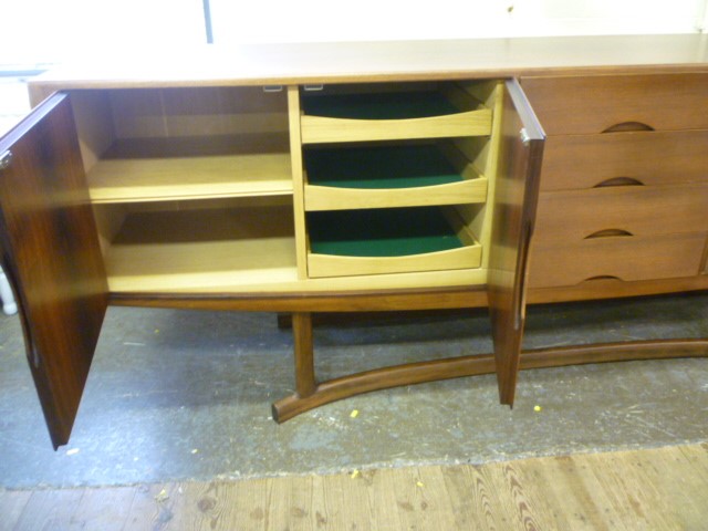 A DANISH ROSEWOOD DINING SUITE possibly by Prebenskoven Image