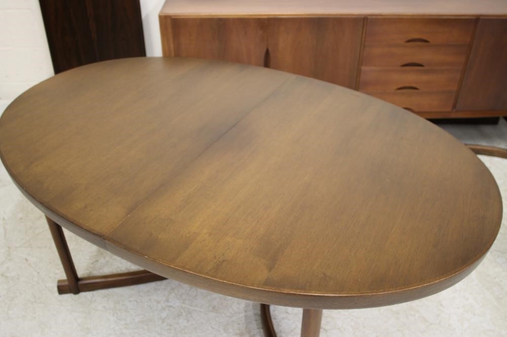 A DANISH ROSEWOOD DINING SUITE possibly by Prebenskoven Image