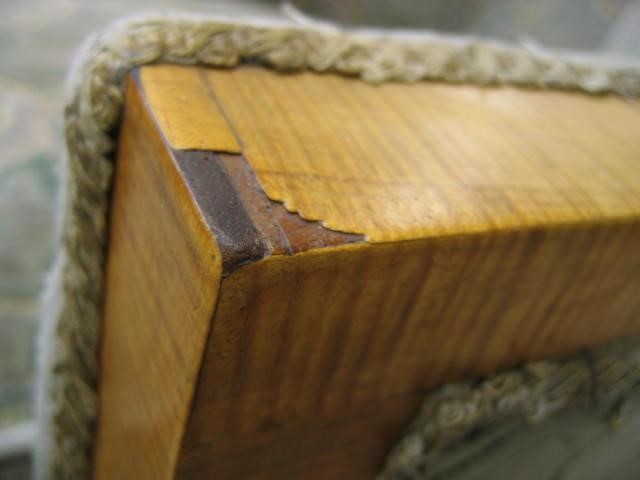 AN ART DECO SITTING ROOM SUITE in satinwood veneer with ebonised panels Image