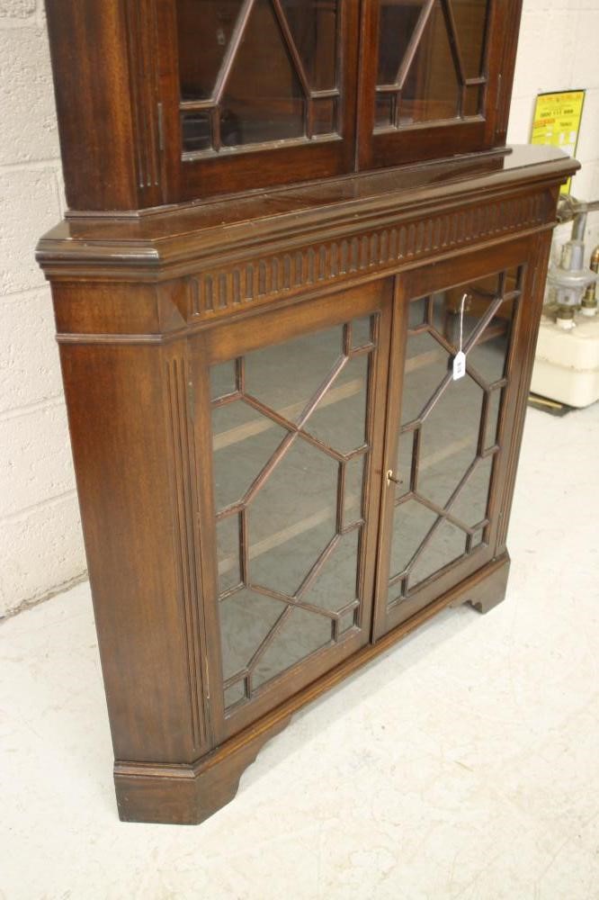 A GEORGIAN REVIVAL MAHOGANY STANDING CORNER CUPBOARD Image