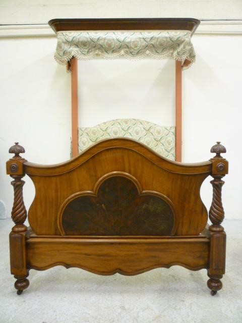 A VICTORIAN MAHOGANY HALF TESTER BEDSTEAD with moulded cornice Image