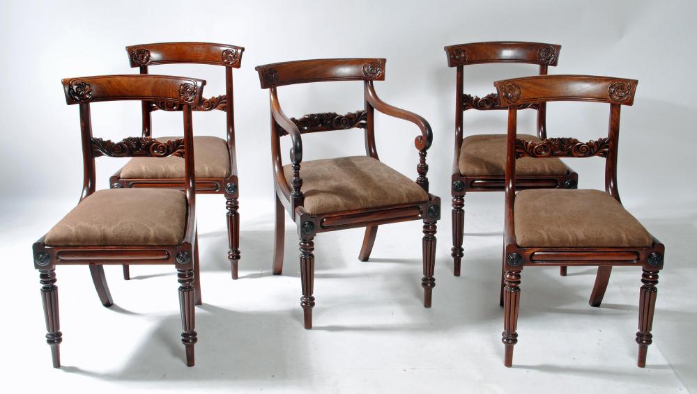 A SET OF FIVE EARLY VICTORIAN MAHOGANY DINING CHAIRS including an elbow chair Image